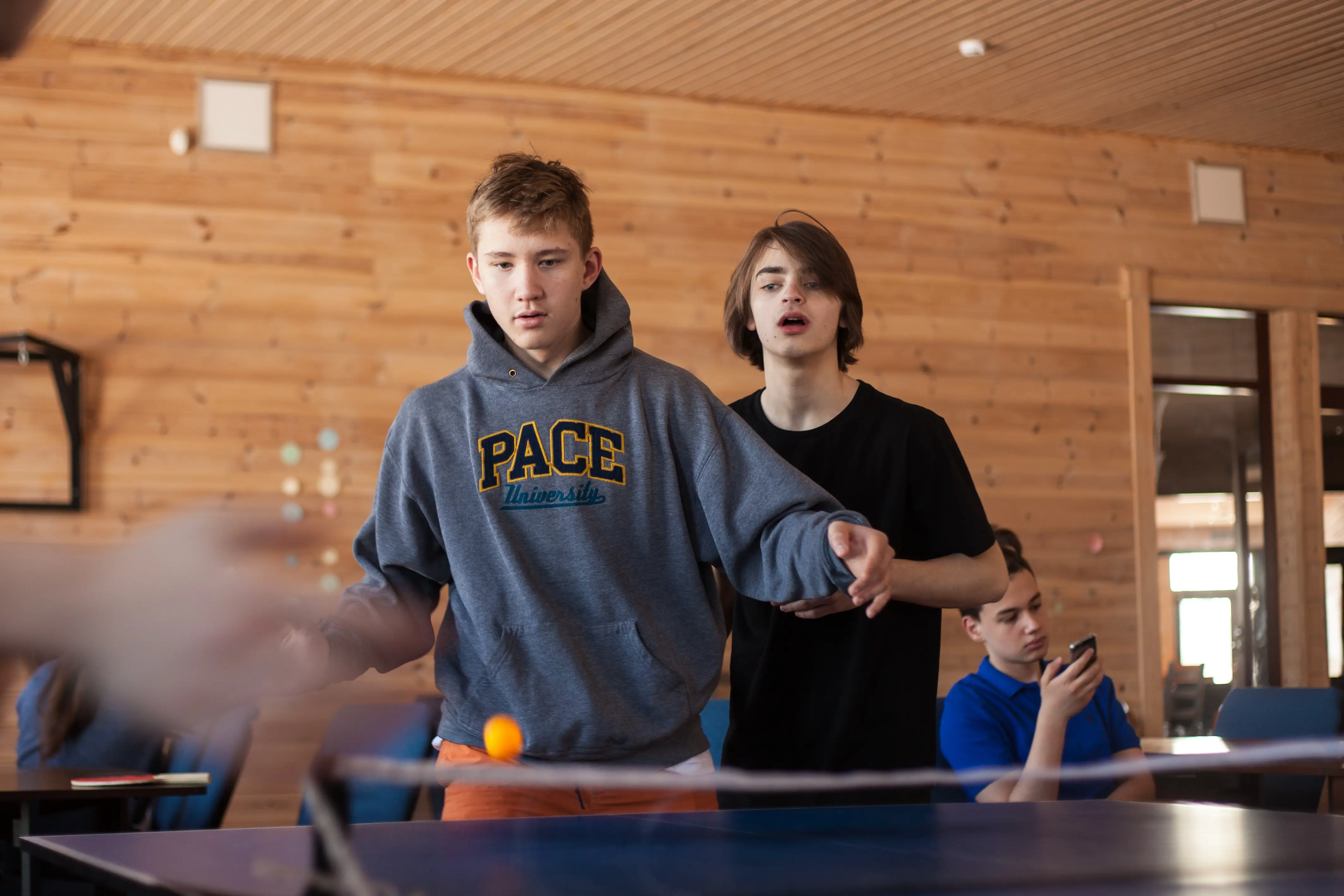 boys playing table tennis
